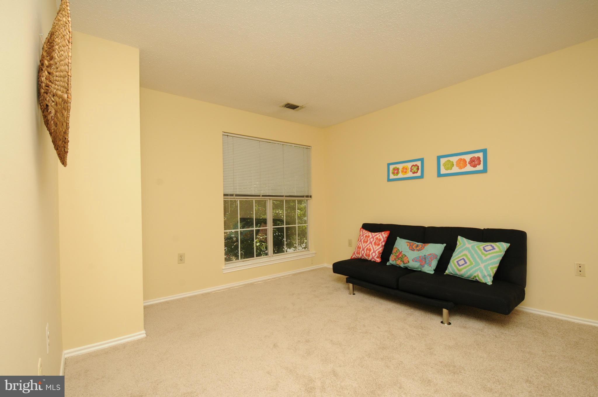 20985 Timber Ridge Terrace, Unit 204 Ashburn, VA 20147 - Photo 12 of 21 Bedroom 2