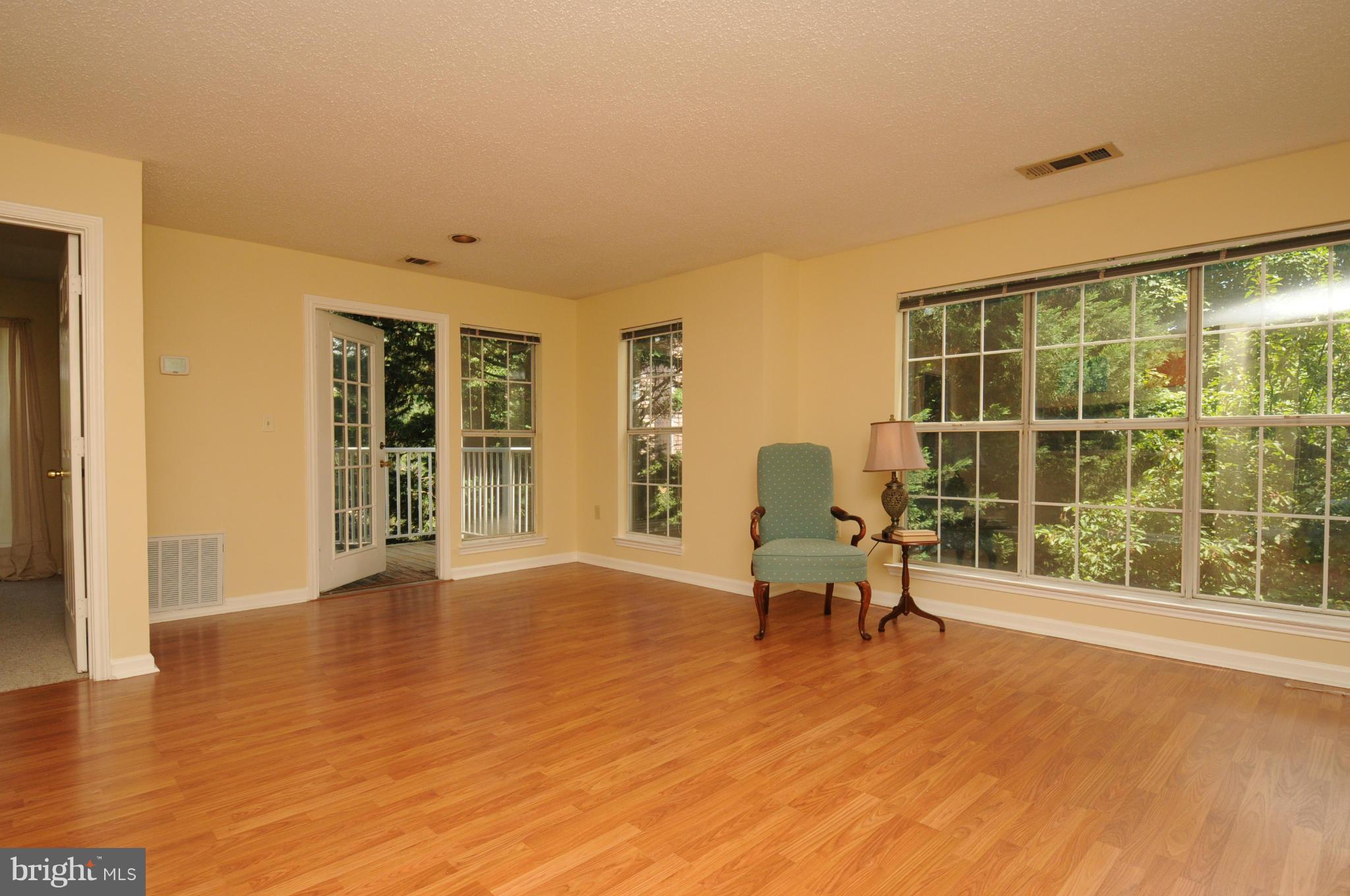 20985 Timber Ridge Terrace, Unit 204 Ashburn, VA 20147 - Photo 7 of 21 Dining/Living Room
