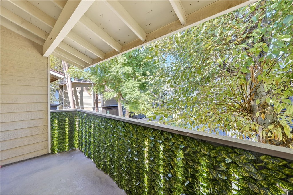 3535 Banbury Drive, Unit 14 Riverside, CA 92505 - Photo 16 of 17 a view of balcony with yard