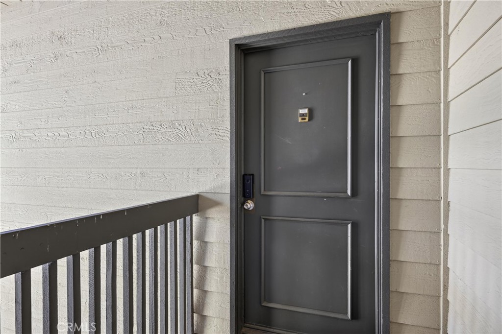 3535 Banbury Drive, Unit 14 Riverside, CA 92505 - Photo 2 of 17 a bathroom with a glass door shower
