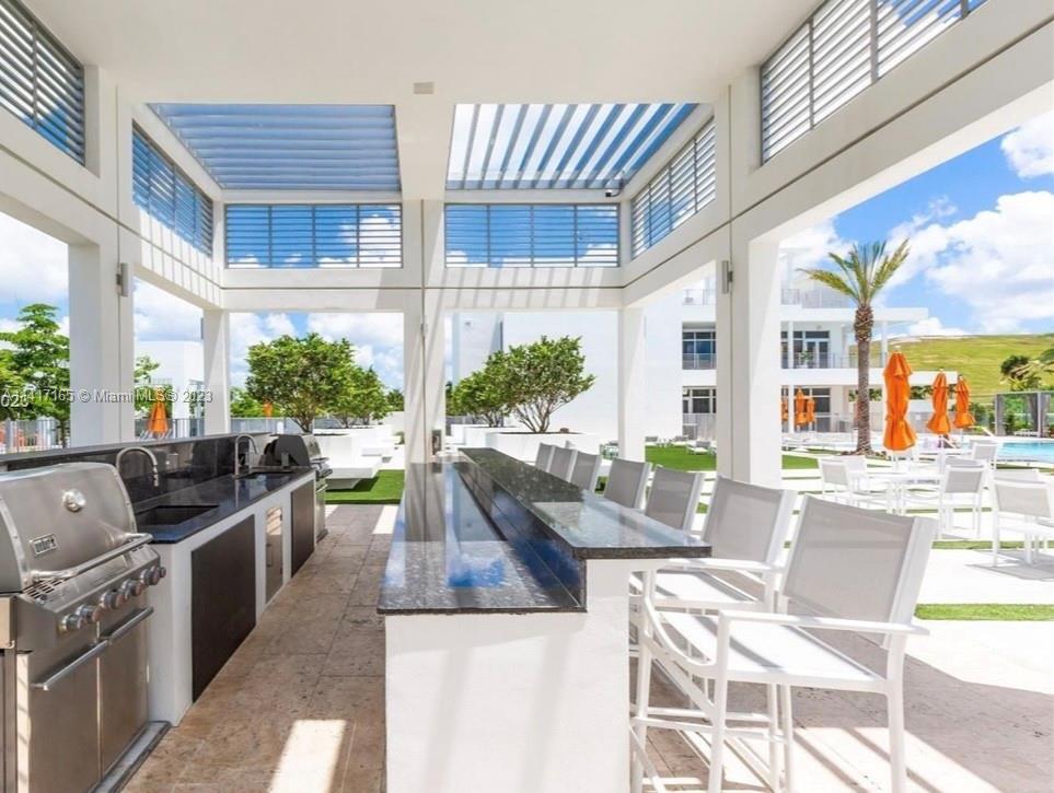 Doral Doral, FL 33178 - Photo 6 of 16 a view of an house with backyard outdoor seating