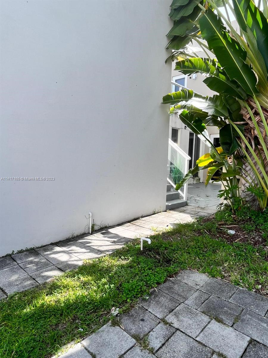 Doral Doral, FL 33178 - Photo 9 of 16 a backyard of a house with lots of green space