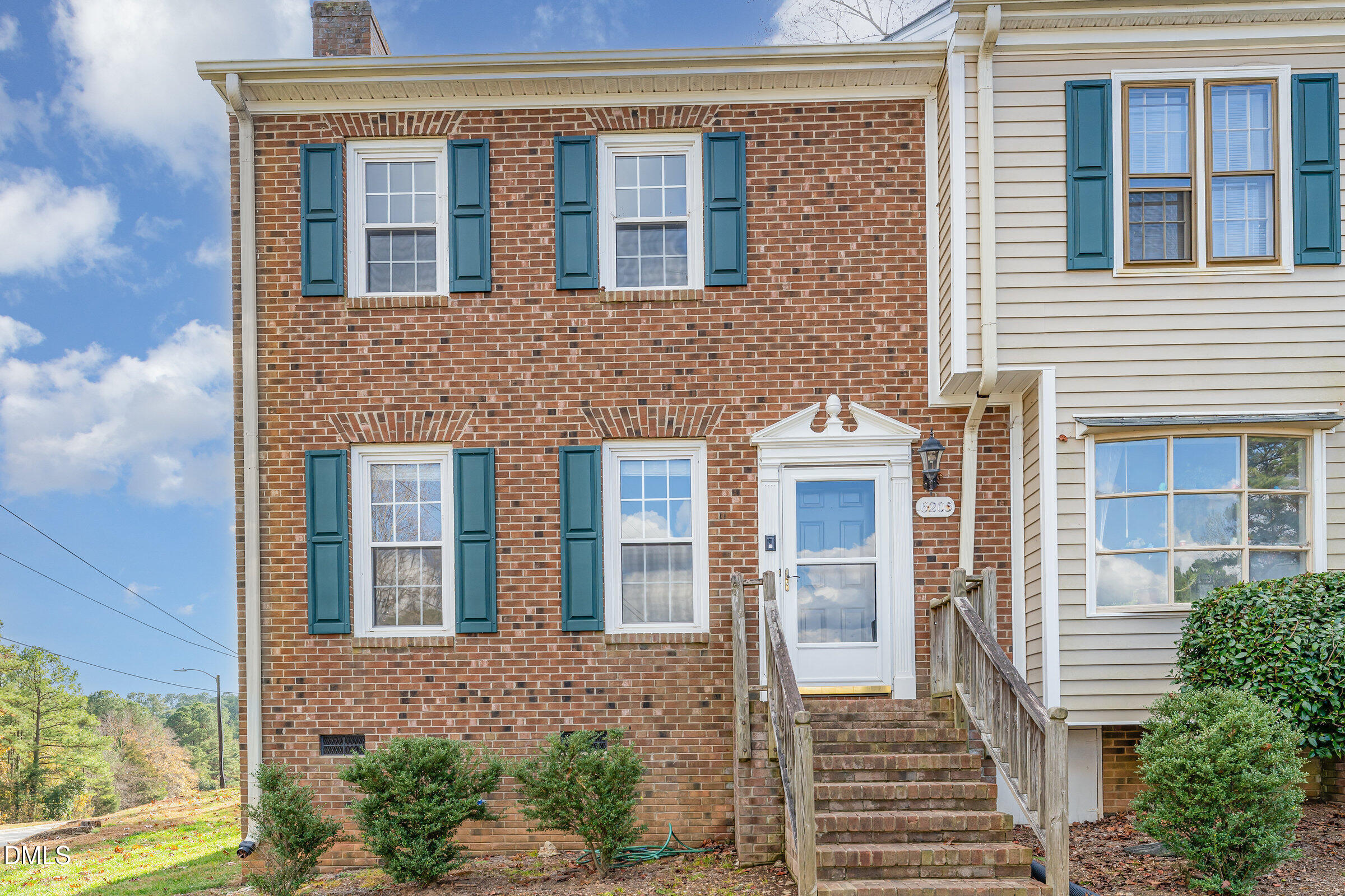 6205 Waterside Lane Raleigh, NC 27613 - Photo 1 of 40 front view of a brick house