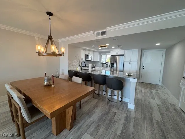 a view of a dining room with furniture