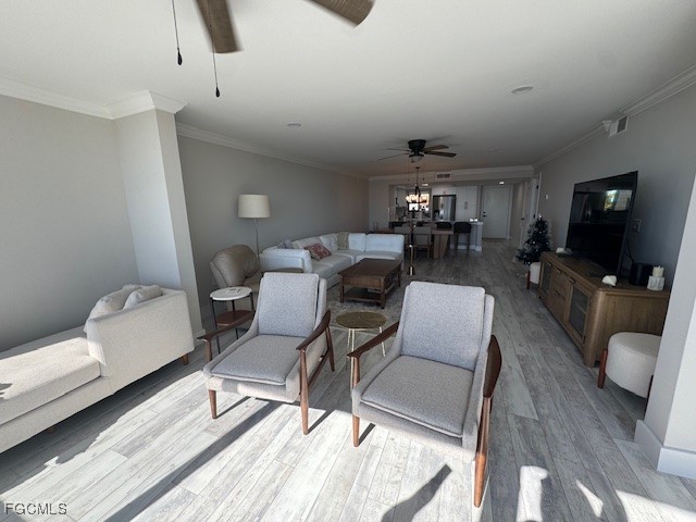 15010 Punta Rassa Road, Unit 404 Fort Myers, FL 33908 - Photo 16 of 29 a living room with furniture a flat screen tv and a rug