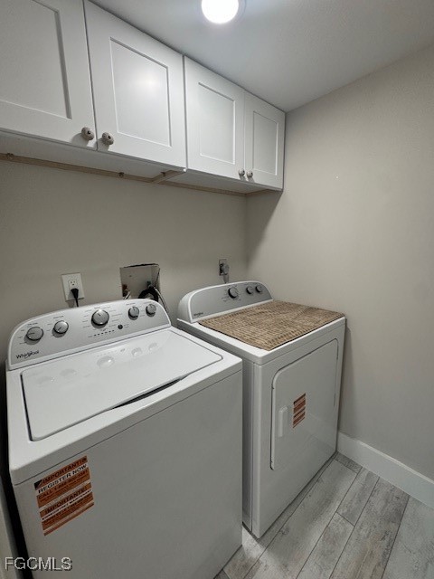 15010 Punta Rassa Road, Unit 404 Fort Myers, FL 33908 - Photo 22 of 29 a utility room with dryer and washer
