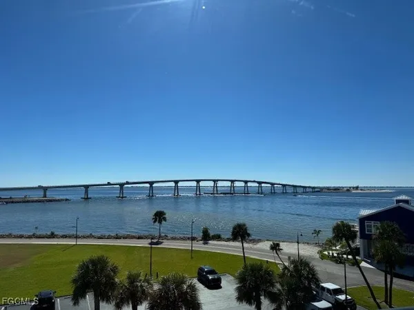 a view of a swimming pool and a yard