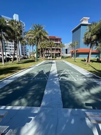 a view of multiple houses with a yard