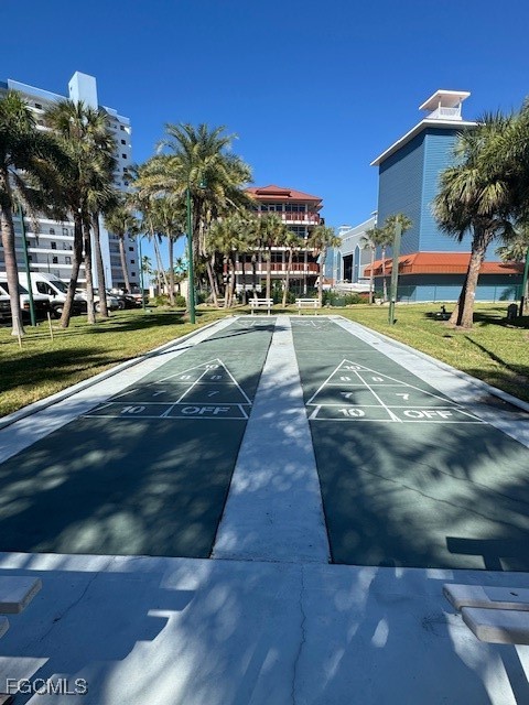 15010 Punta Rassa Road, Unit 404 Fort Myers, FL 33908 - Photo 5 of 29 a view of multiple houses with a yard