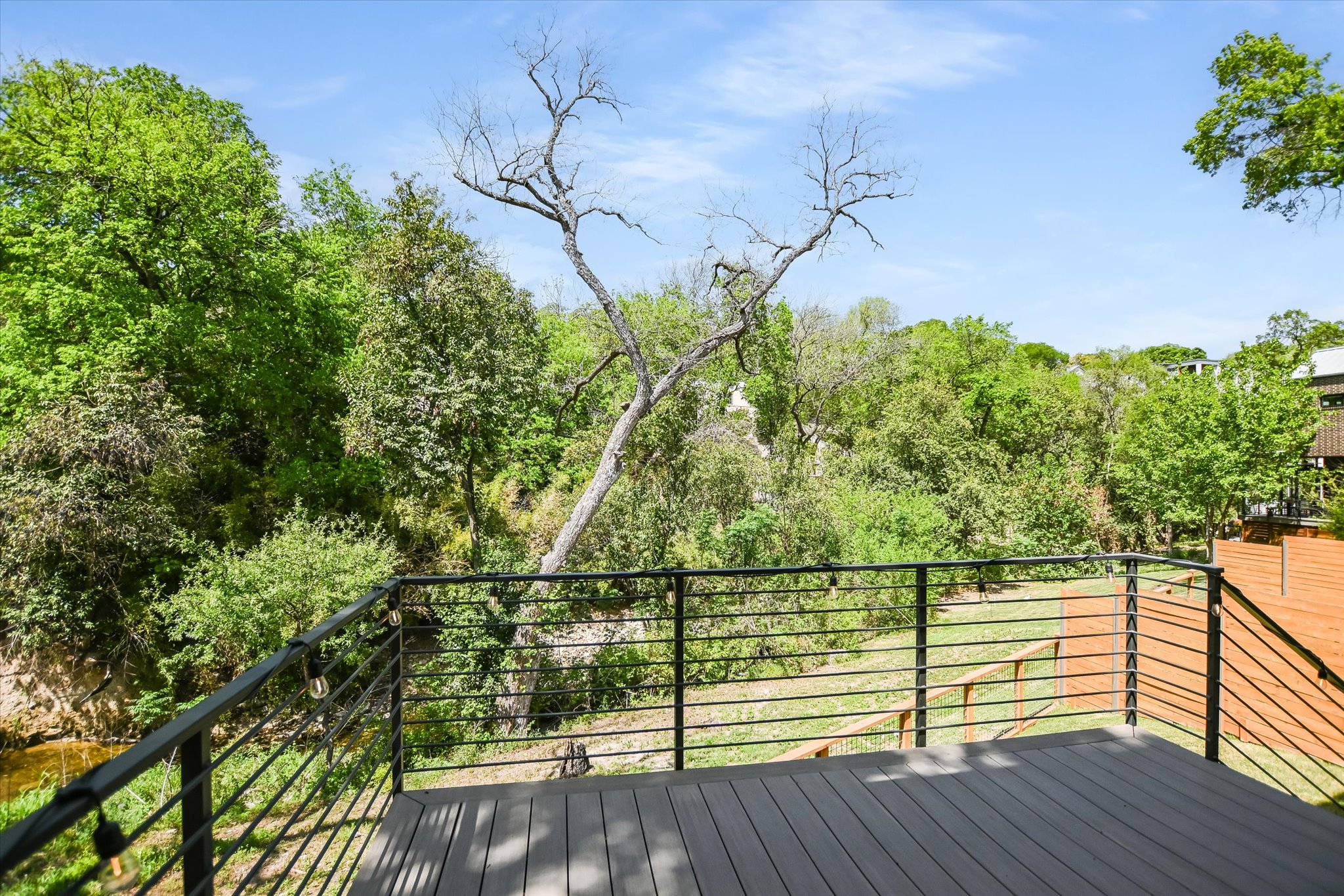 900 South 2nd Street, Unit 6 Austin, TX 78704 - Photo 24 of 25 a view of outdoor space with deck and wooden floor