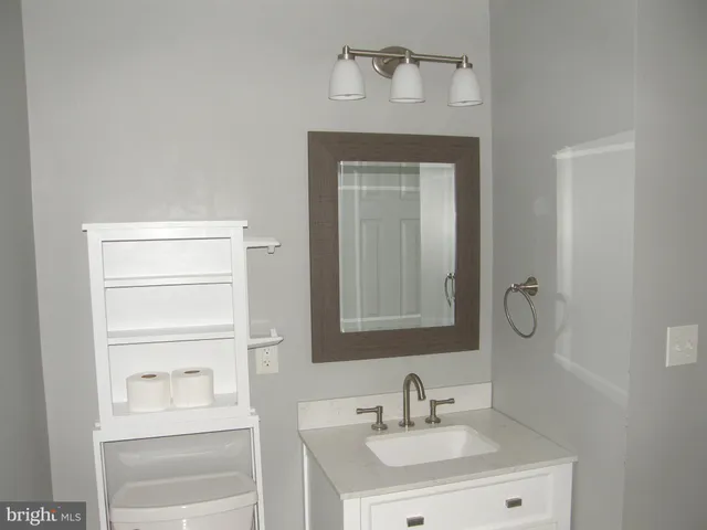 a front view of a house with parking