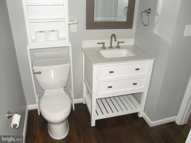 a bathroom with a shower and a toilet