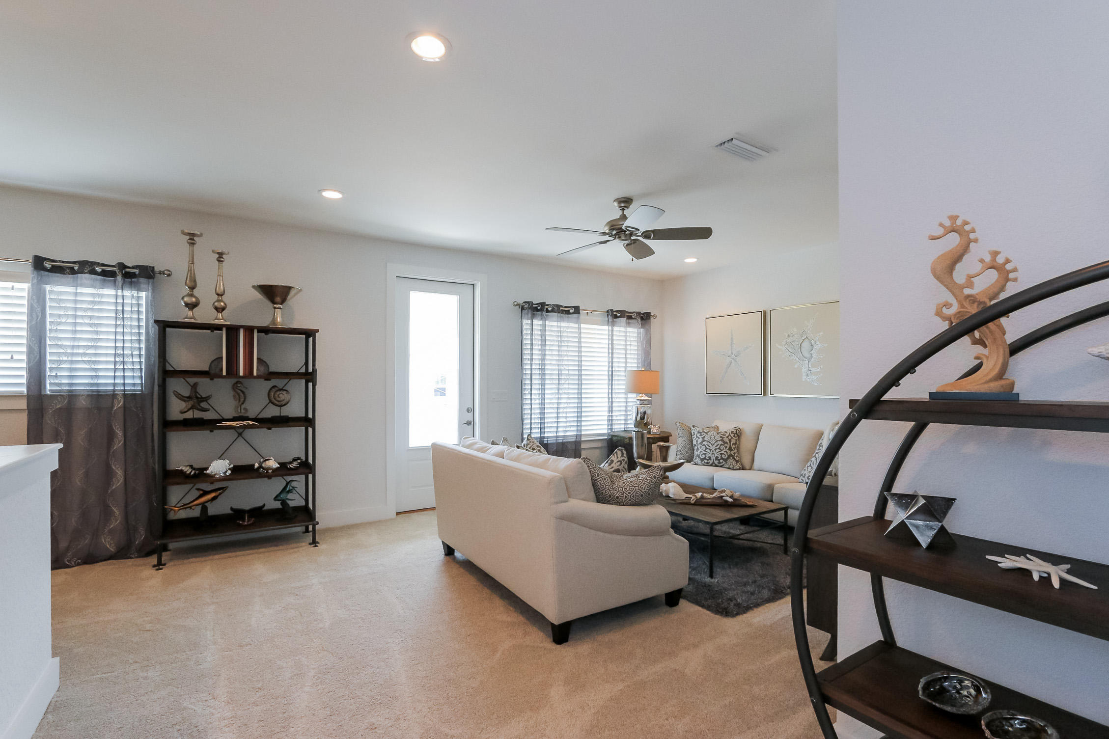 995 Airport Road, Unit 5 Destin, FL 32541 - Photo 19 of 26 a living room with furniture and decor