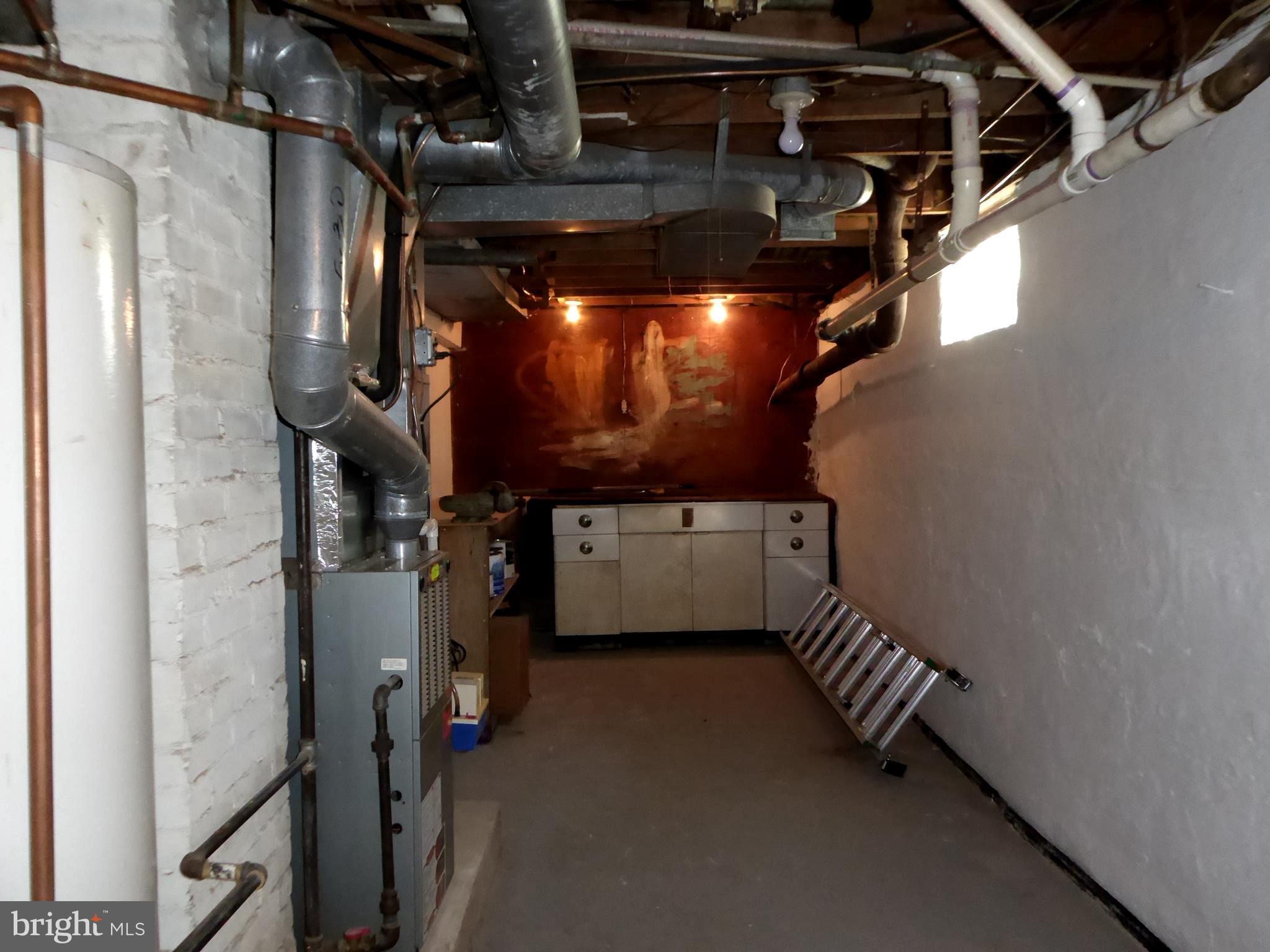 3010 Findley Road Kensington, MD 20895 - Photo 27 of 31 Utility room with work shop space