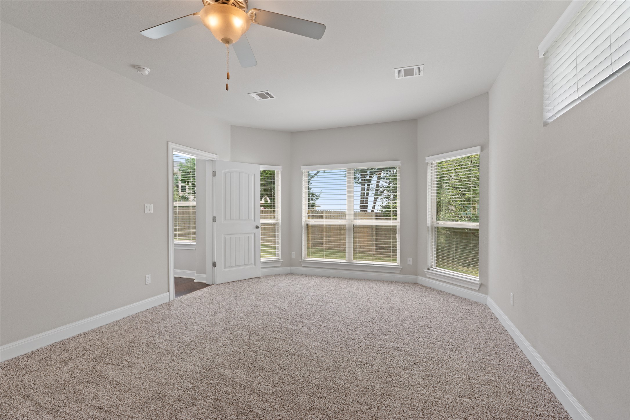 15601 Cabrillo Way Austin, TX 78738 - Photo 23 of 32 Neutral-toned carpeting throughout
