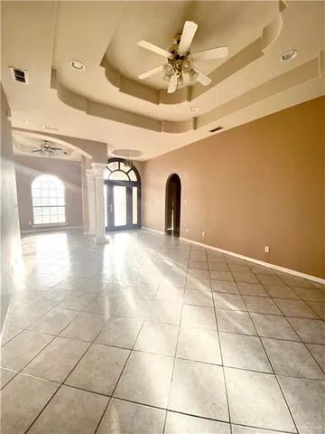 a view of a room with white walls