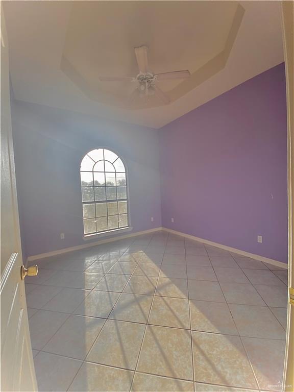 3631 Lott Road Donna, TX 78537 - Photo 17 of 24 an empty room with a fireplace and windows