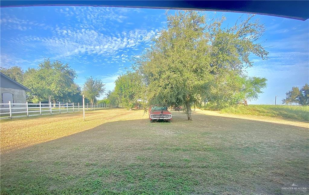 3631 Lott Road Donna, TX 78537 - Photo 24 of 24 a view of a swimming pool with an outdoor space and seating area