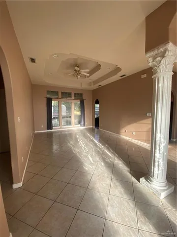 a view of a livingroom with a staircase