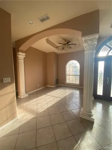 an empty room with windows