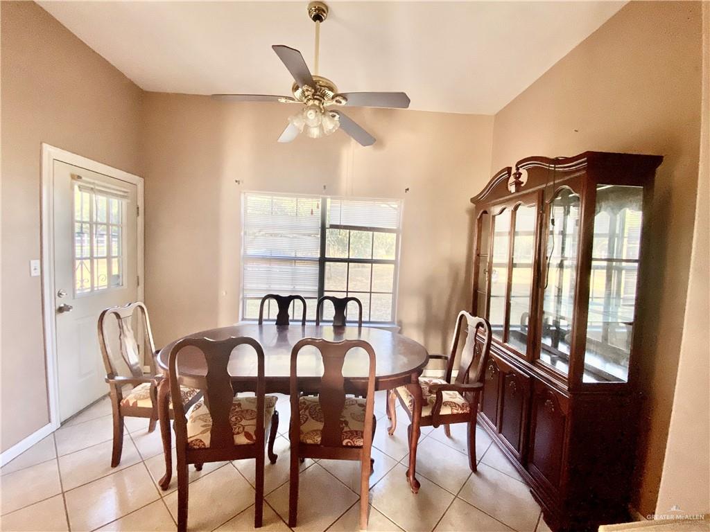 3631 Lott Road Donna, TX 78537 - Photo 8 of 24 a view of a dining room with furniture and window