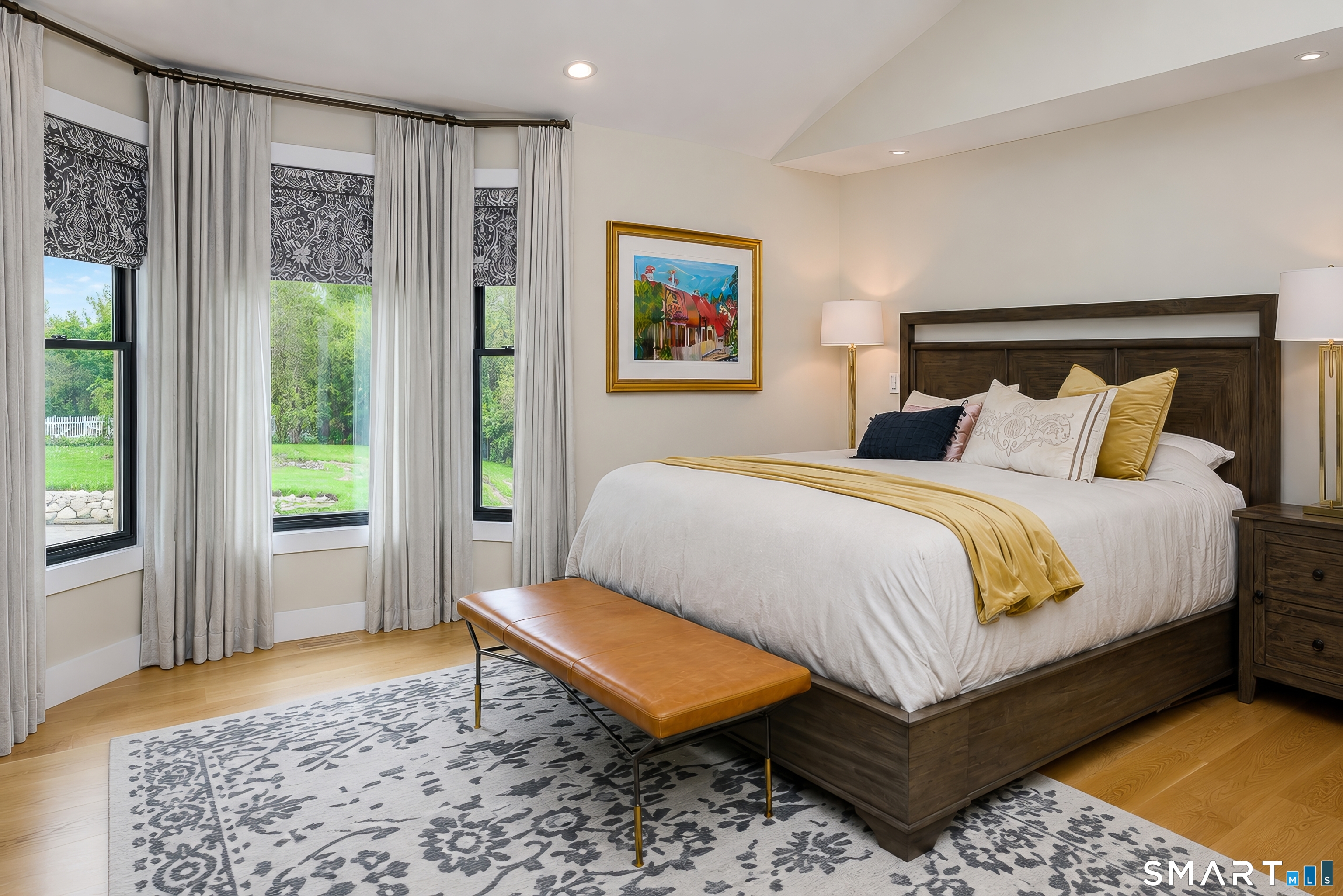 8 East Wharf Road Waterford, CT 06385 - Photo 15 of 40 a bedroom with a bed and wooden floor
