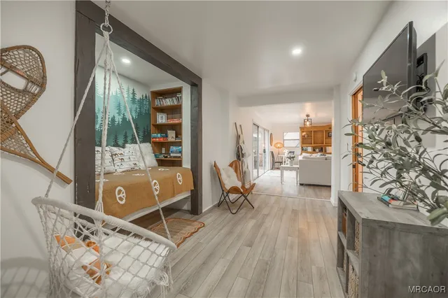 a living room with furniture and a rug