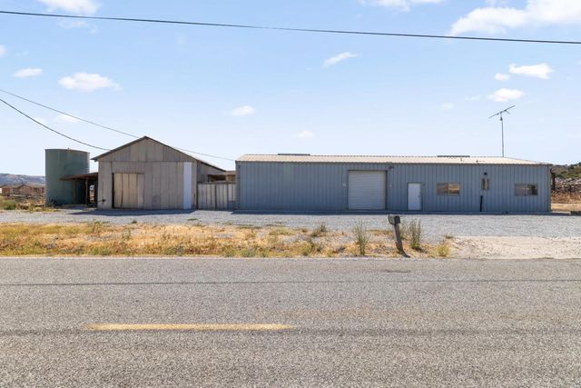 a view of kitchen with wooden floor