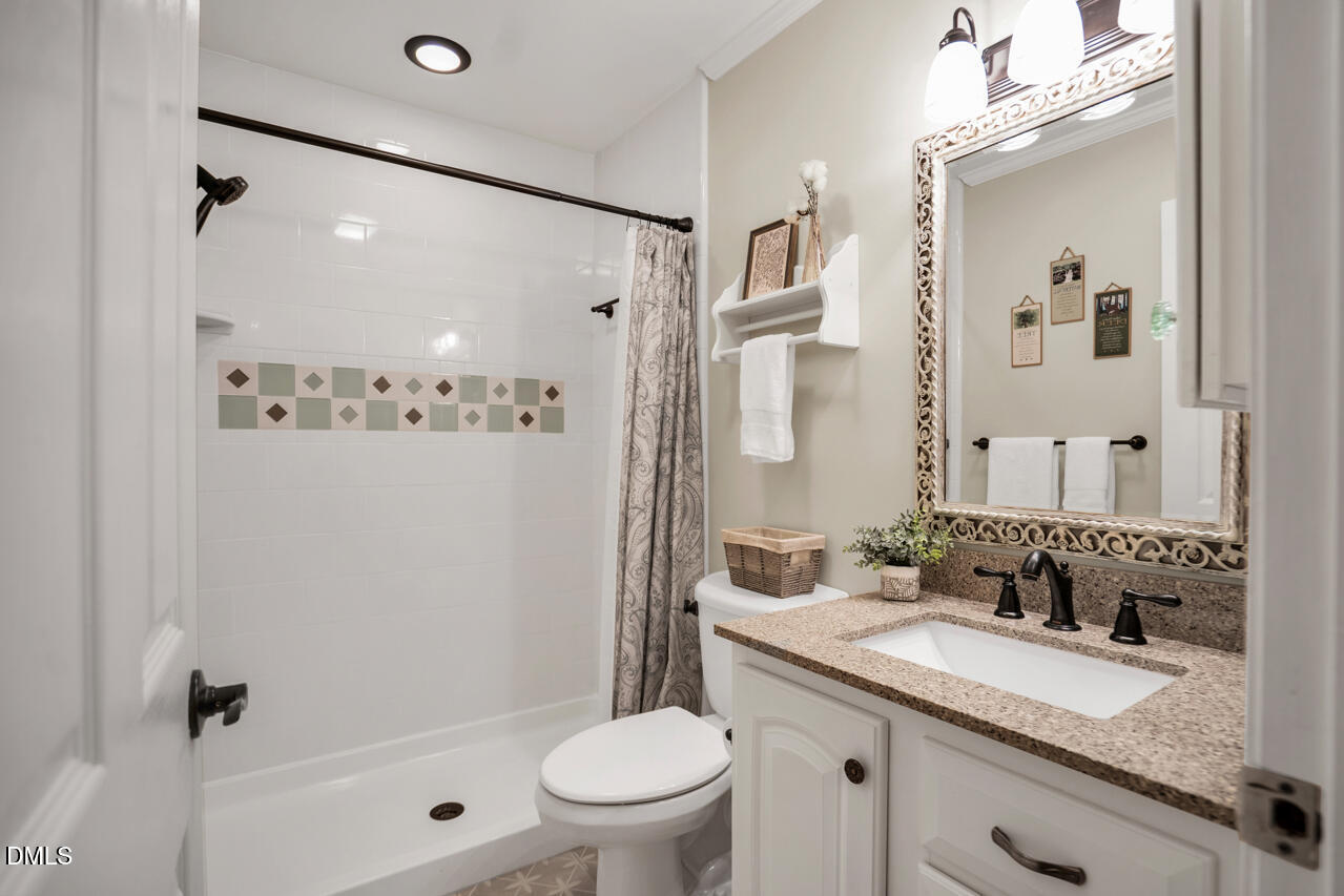 83 Stoneridge Road Durham, NC 27705 - Photo 27 of 51 First floor bathroom
