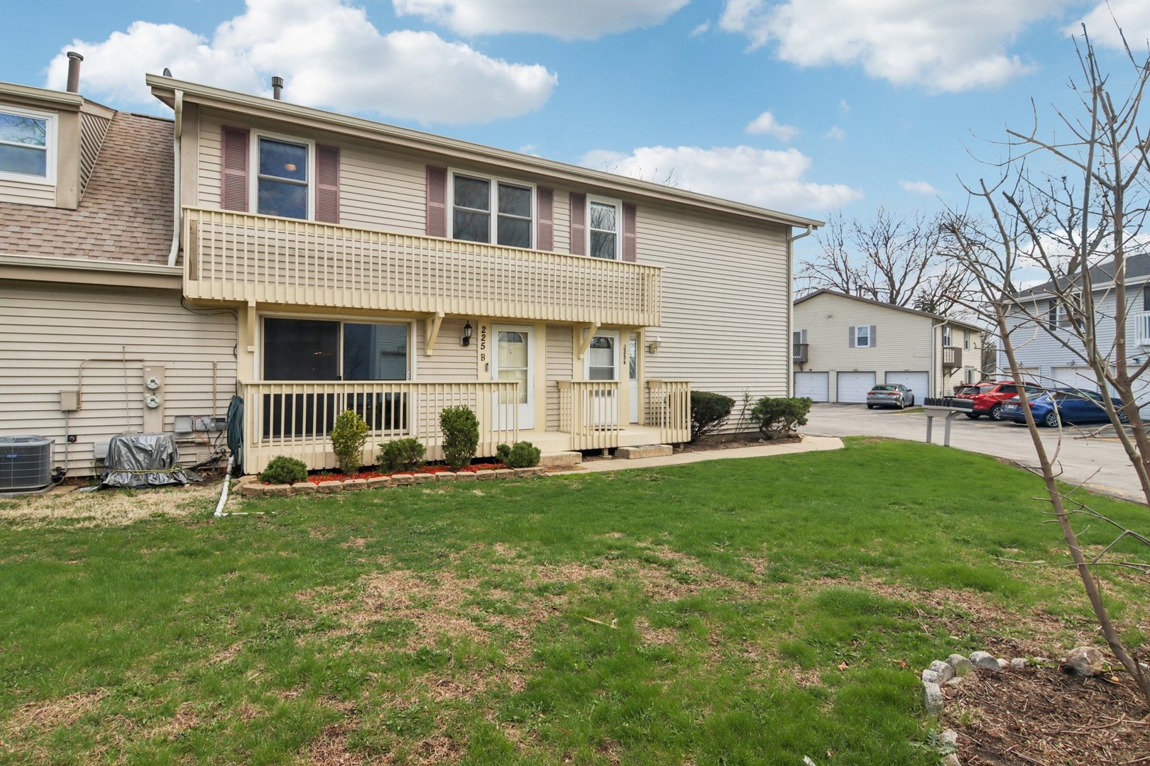 225 Foxhead Court, Unit B Bolingbrook, IL 60440 - Photo 12 of 14 a front view of a house with a yard