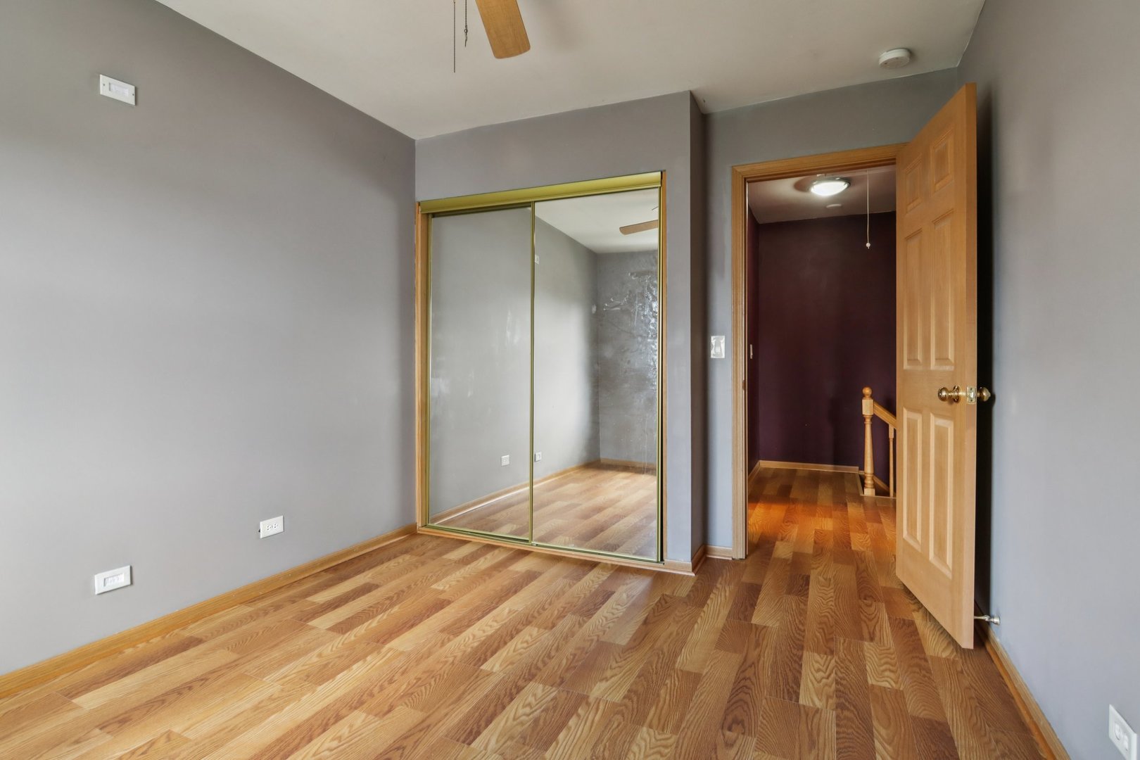 225 Foxhead Court, Unit B Bolingbrook, IL 60440 - Photo 10 of 14 a view of a room with wooden floor and sliding glass door