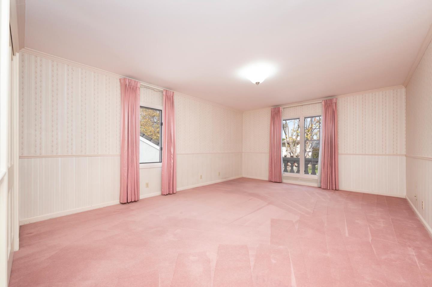 321 Ashton Avenue Millbrae, CA 94030 - Photo 12 of 18 a view of an empty room with a window