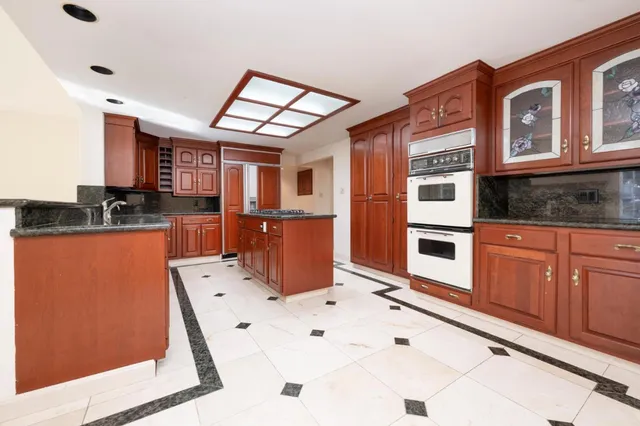a view of livingroom with fireplace and window