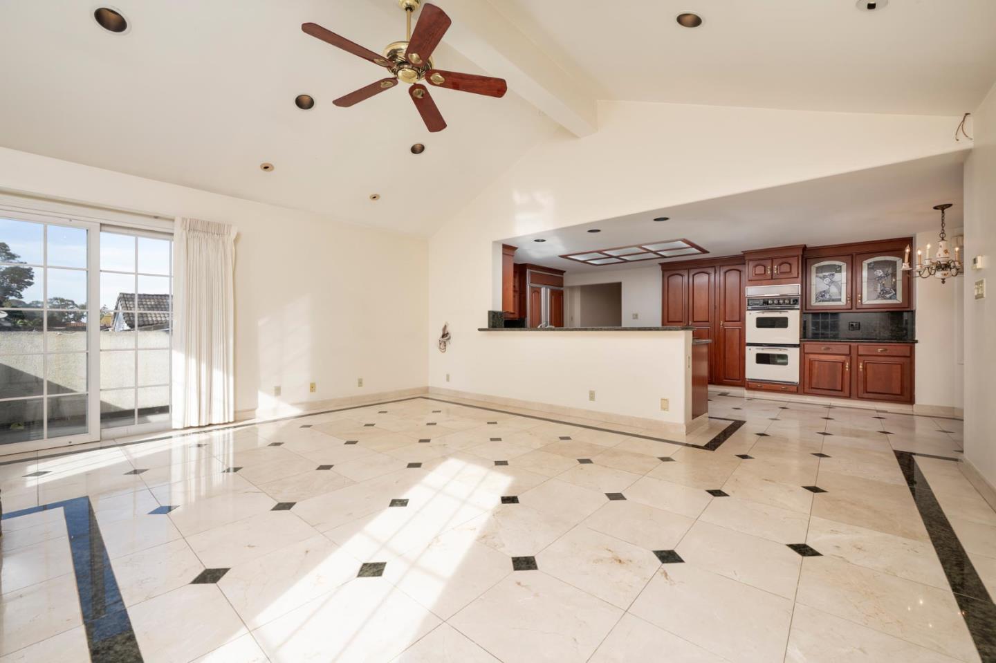 321 Ashton Avenue Millbrae, CA 94030 - Photo 8 of 18 a view of a living room with a large window