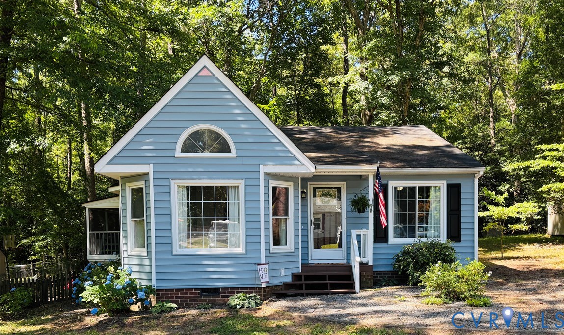 4924 Wilconna Road Chesterfield, VA 23832 - Photo 1 of 22 Light blue siding exterior featuring a prominent g