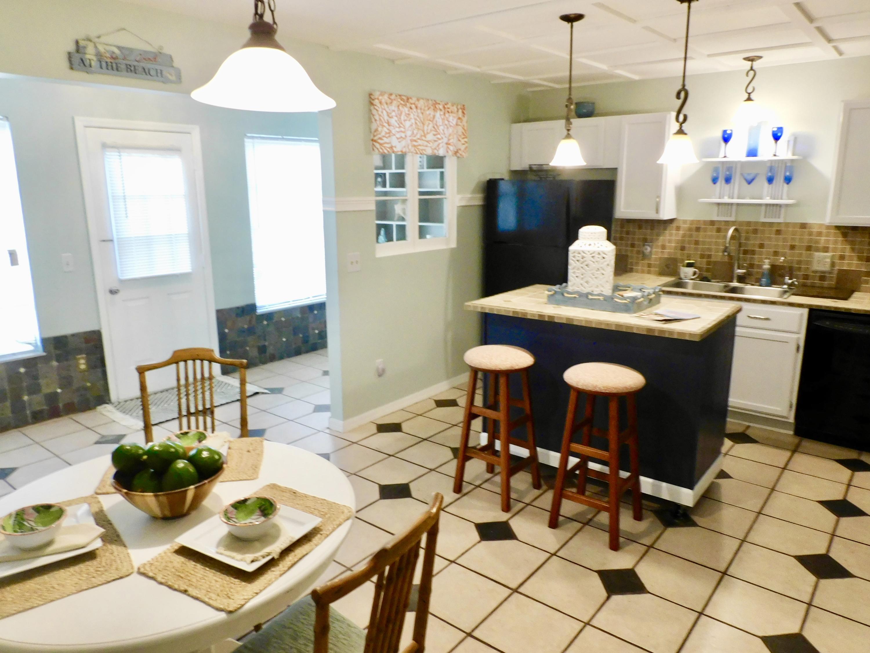 79 Southwest Blackburn Terrace, Unit 4 Stuart, FL 34997 - Photo 15 of 40 Kitchen View to Mudroom
