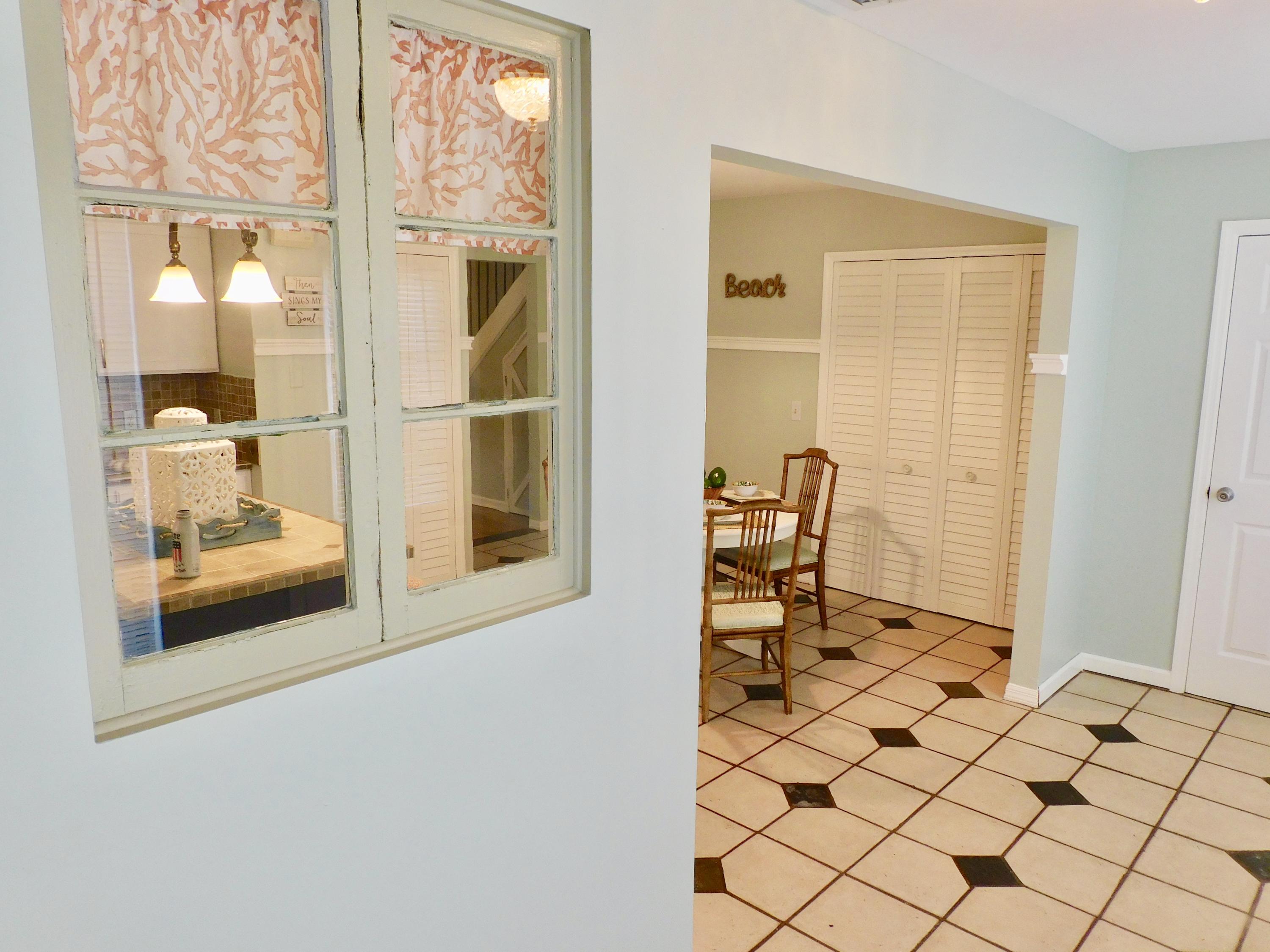 79 Southwest Blackburn Terrace, Unit 4 Stuart, FL 34997 - Photo 17 of 40 Mudroom to Dining
