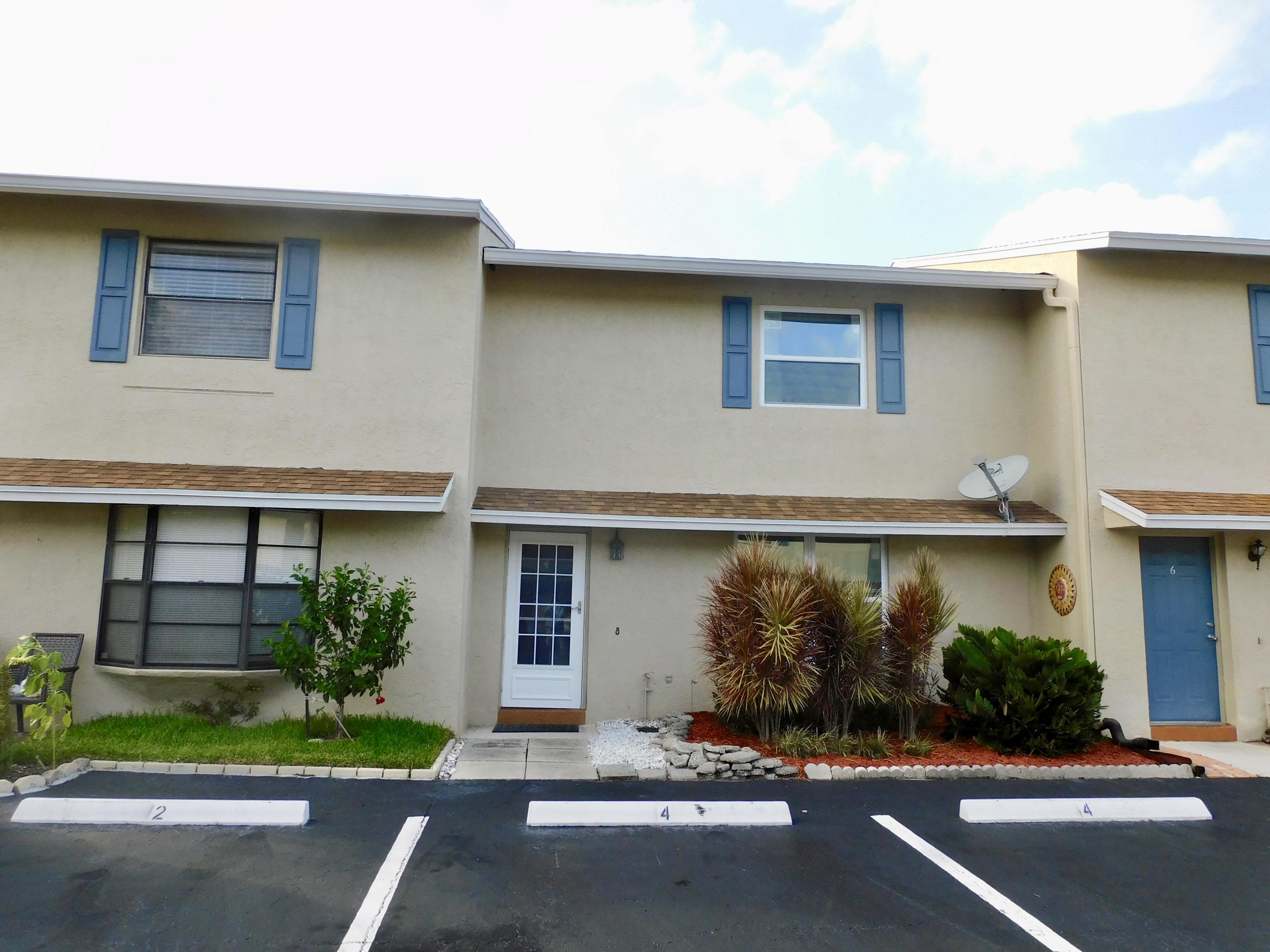 79 Southwest Blackburn Terrace, Unit 4 Stuart, FL 34997 - Photo 2 of 40 Front View