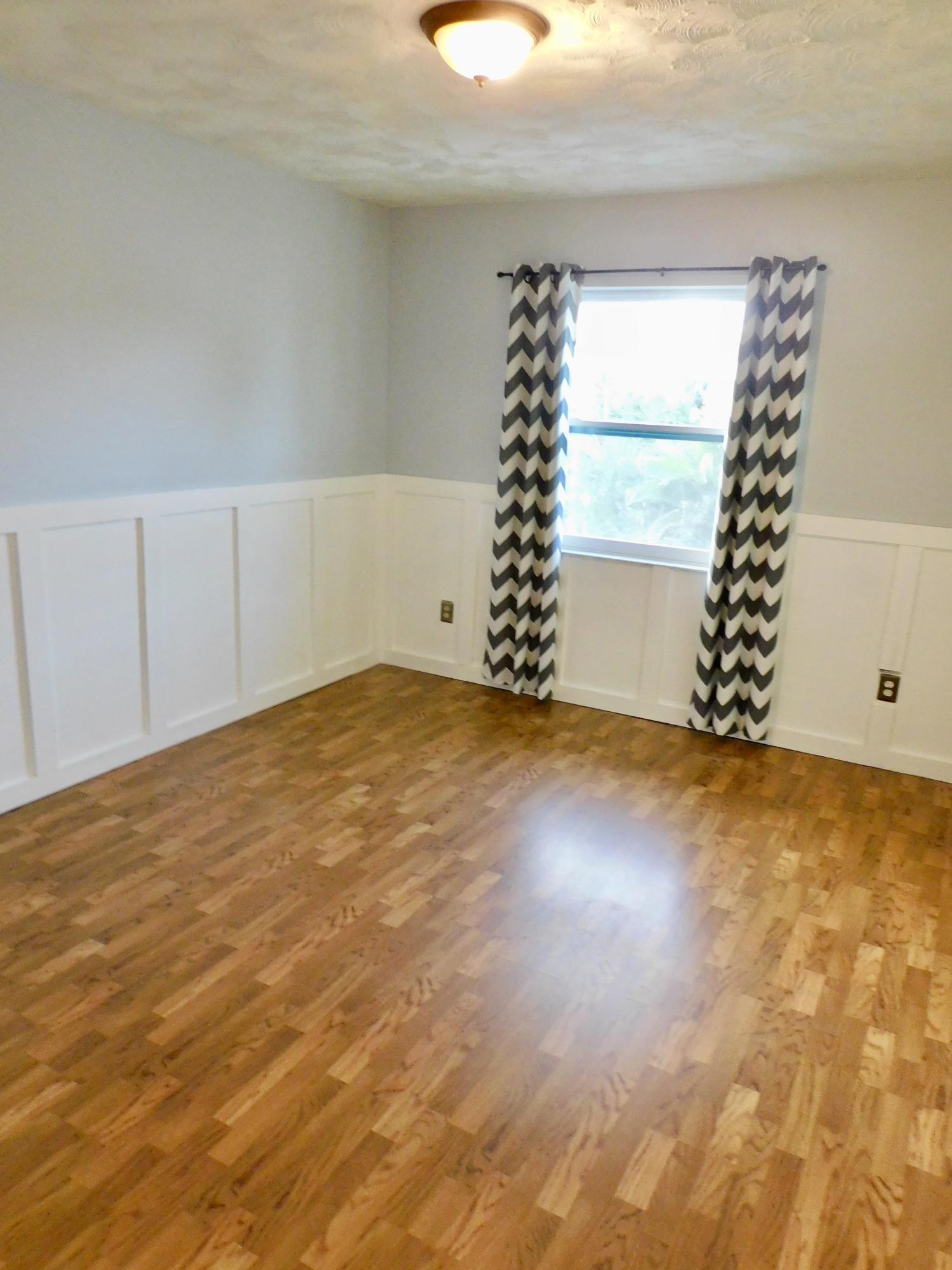 79 Southwest Blackburn Terrace, Unit 4 Stuart, FL 34997 - Photo 23 of 40 Bedroom 2