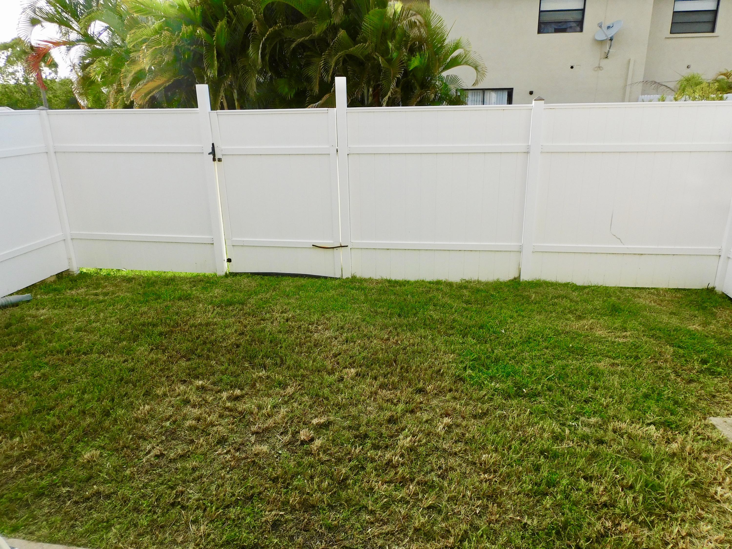 79 Southwest Blackburn Terrace, Unit 4 Stuart, FL 34997 - Photo 32 of 40 Fenced in Yard