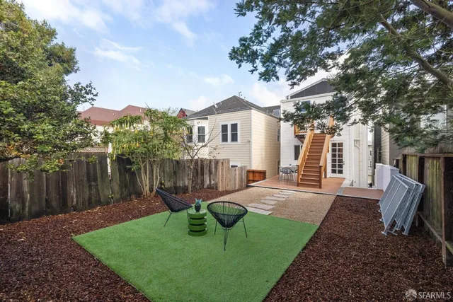 a house view with a garden space