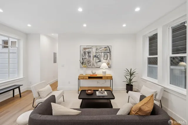 a living room with furniture and window