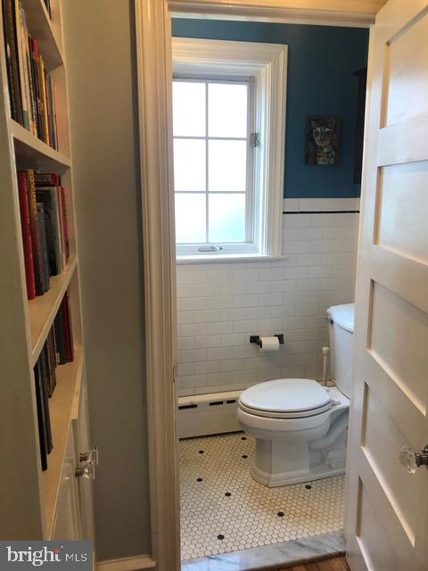 12 Windsor Circle Springfield, PA 19064 - Photo 16 of 28 a bathroom with a toilet and a window