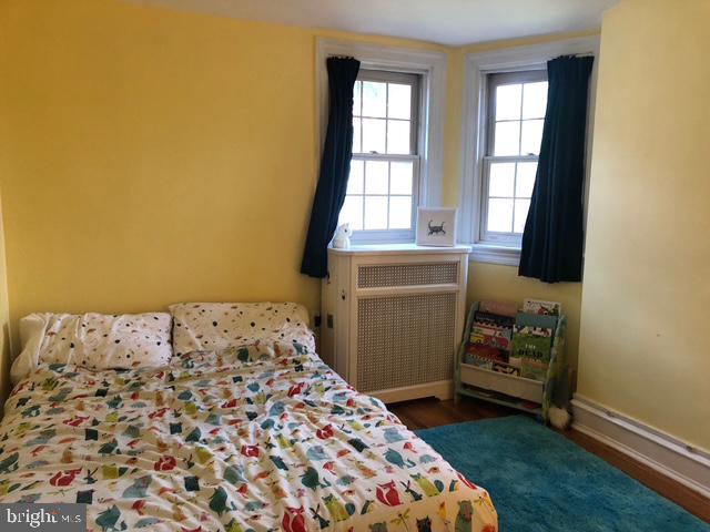 12 Windsor Circle Springfield, PA 19064 - Photo 21 of 28 a bedroom with a bed and a window