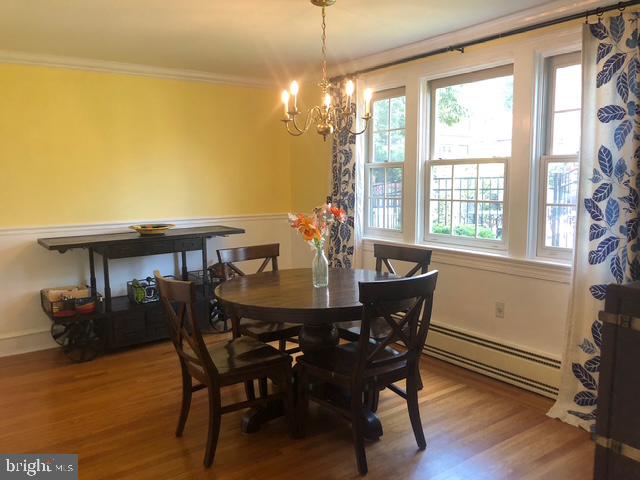12 Windsor Circle Springfield, PA 19064 - Photo 9 of 28 a view of a dining room with furniture and wooden floor