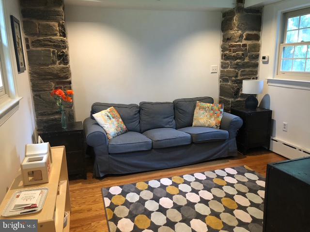 12 Windsor Circle Springfield, PA 19064 - Photo 10 of 28 a living room with furniture and a rug
