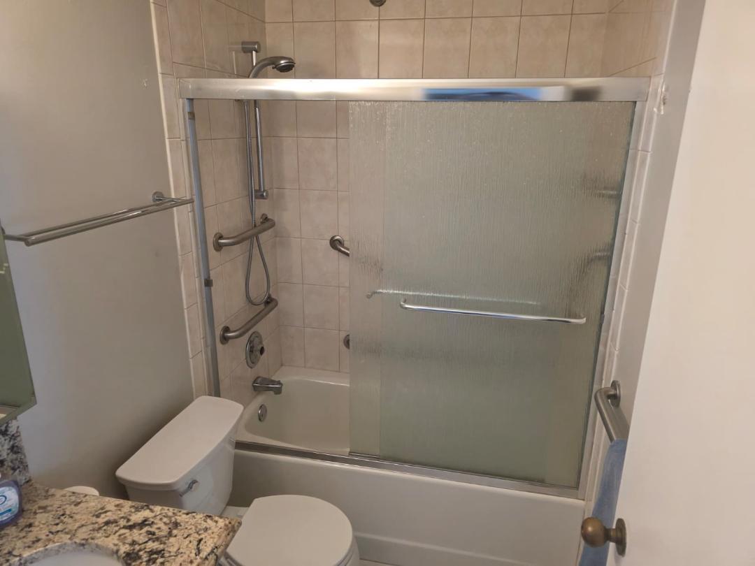 33 West Delaware Place, Unit 10G Chicago, IL 60610 - Photo 11 of 11 a bathroom with a toilet and a shower