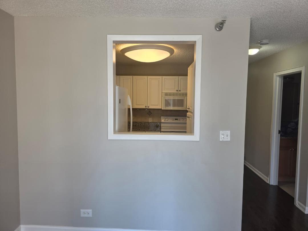 33 West Delaware Place, Unit 10G Chicago, IL 60610 - Photo 6 of 11 a view of a room that has a window