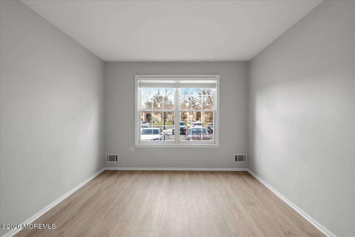 405 Wellington Place Matawan, NJ 07747 - Photo 22 of 29 an empty room with a window