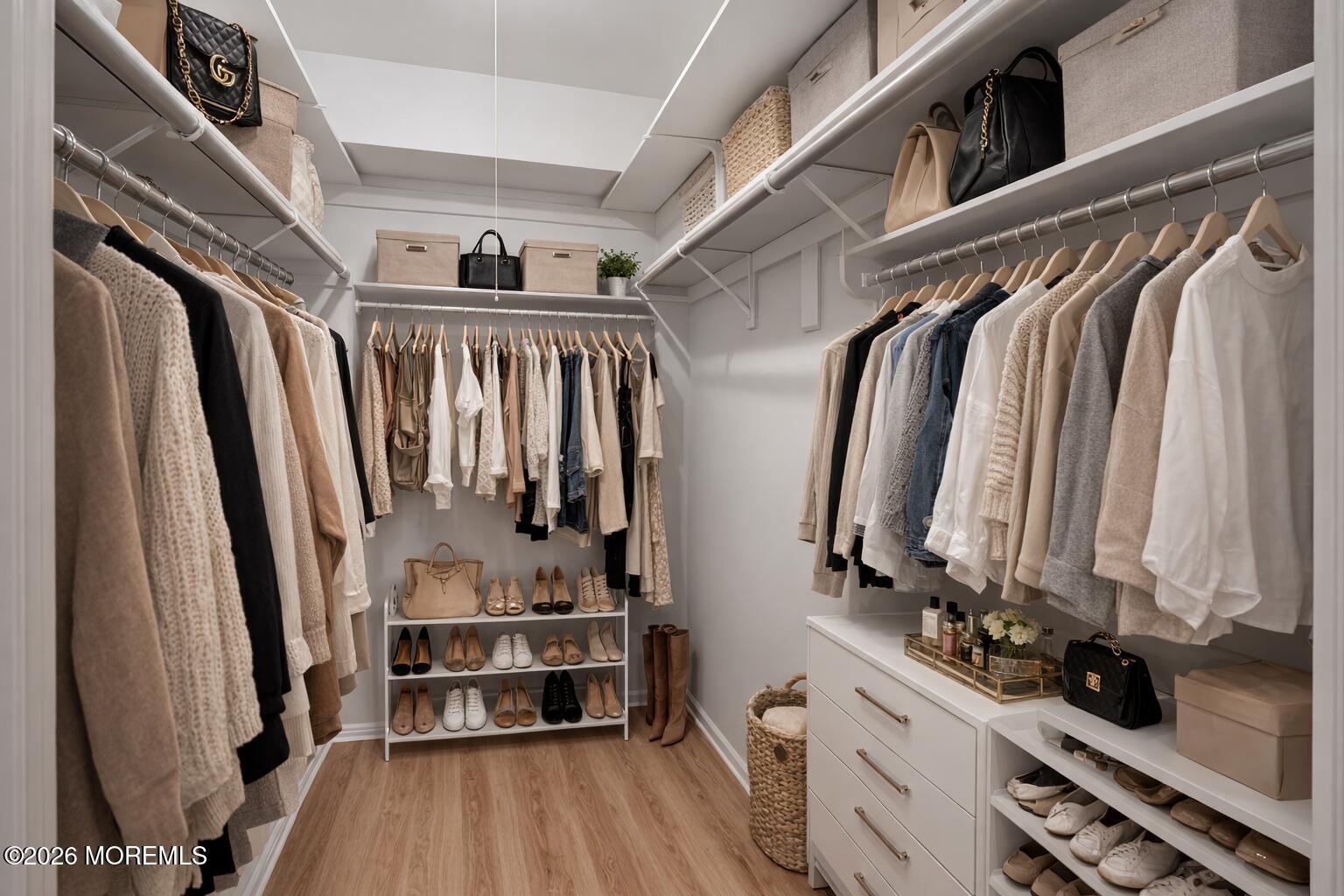 405 Wellington Place Matawan, NJ 07747 - Photo 24 of 29 a view of walk in closet with clothes and shoes